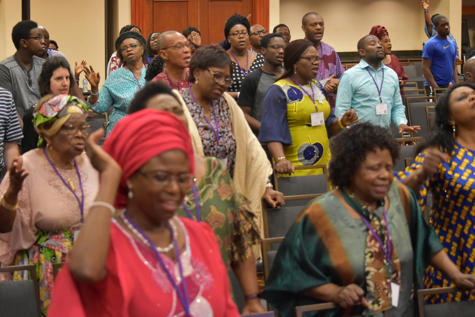 A room full of ACF members in worship