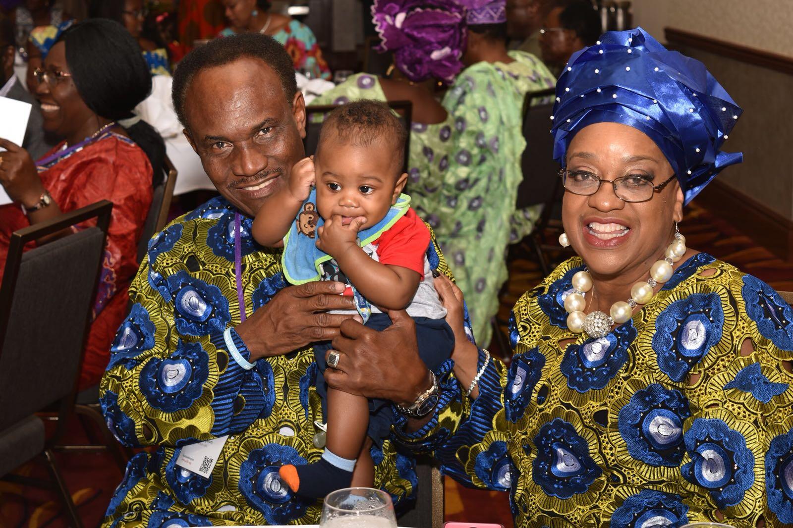 A family in matching outfits with their baby